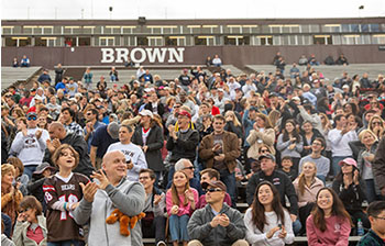 crowd cheering at Brown football game