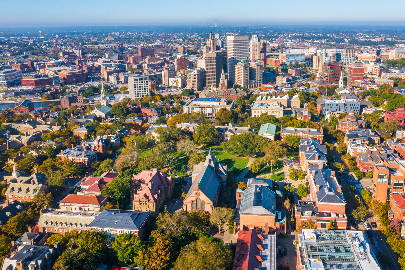 Aerial photo of campus with the Providence skyline