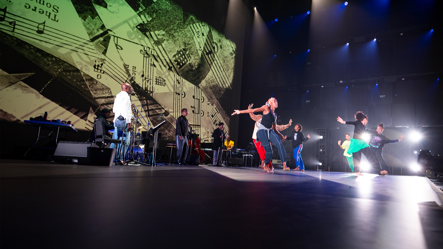 Performers dance on stage at The Lindemann Performing Arts Center at Brown.