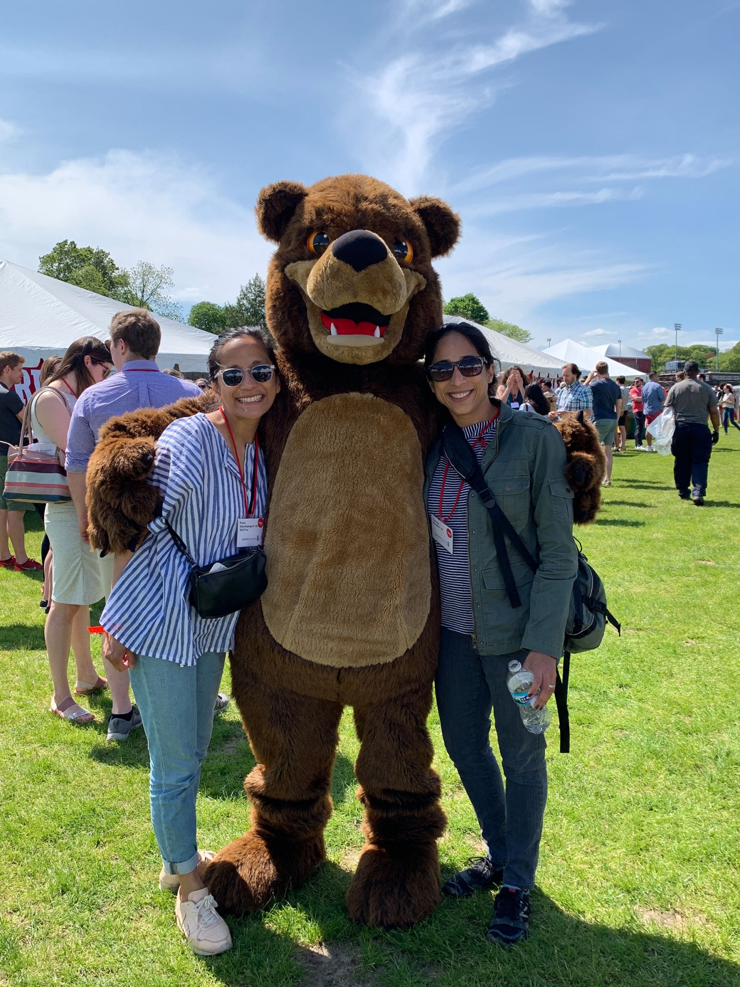 Theresa and Patra pose with Bruno outdoors during Reunion Weekend at Brown.