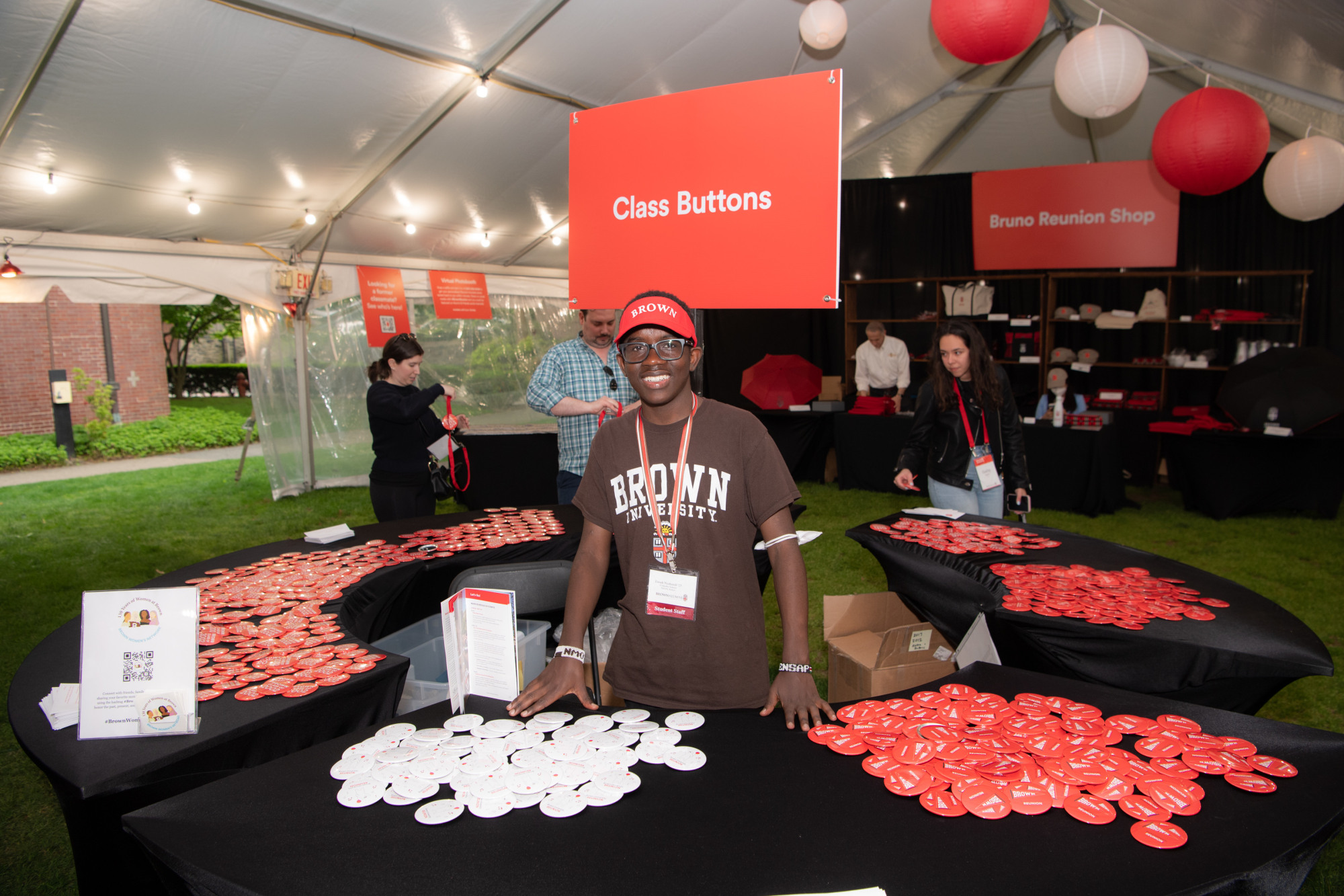 A member of Reunion staff at the Class Buttons table