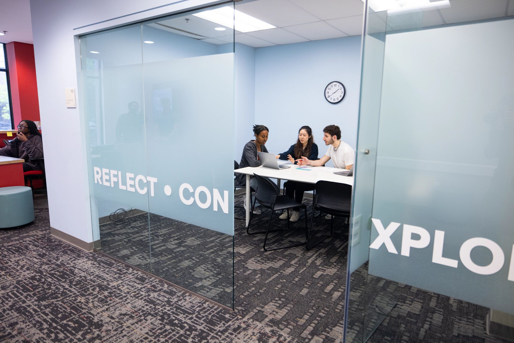 A photo of students working together in the Center for Career Exploration