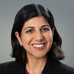 A headshot of Nisha Bansal