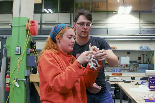 Two students working on a project at the Brown Design Workshop