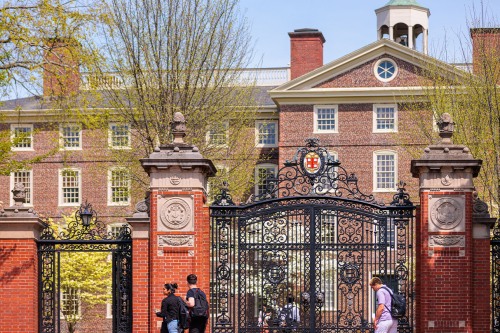 University Hall and the main green with the Providence skyline in the background