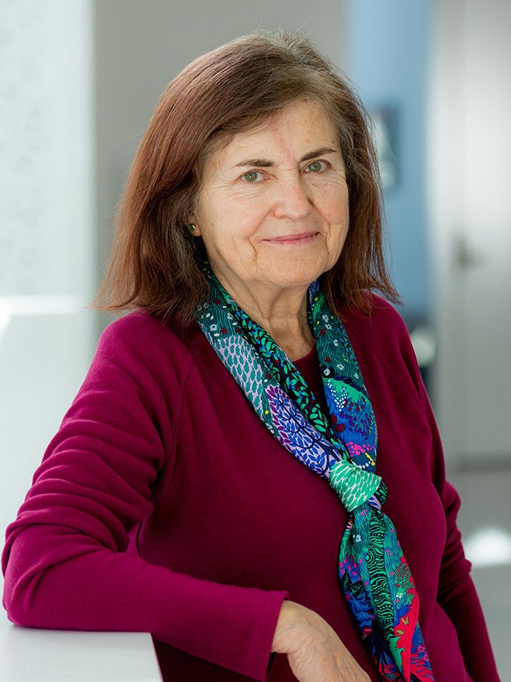 smiling Mercedes Domenech seated