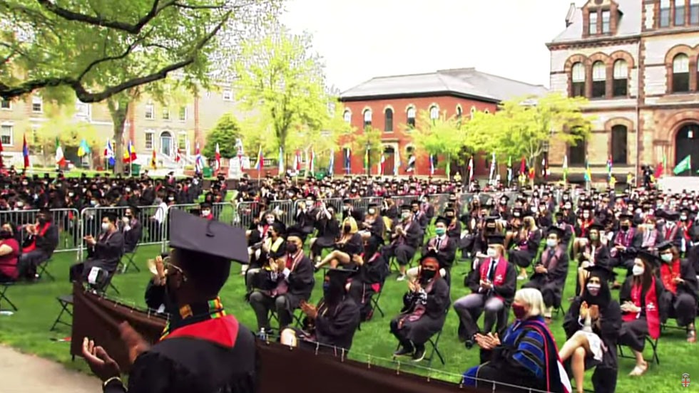 Commencement on campus - students on Green