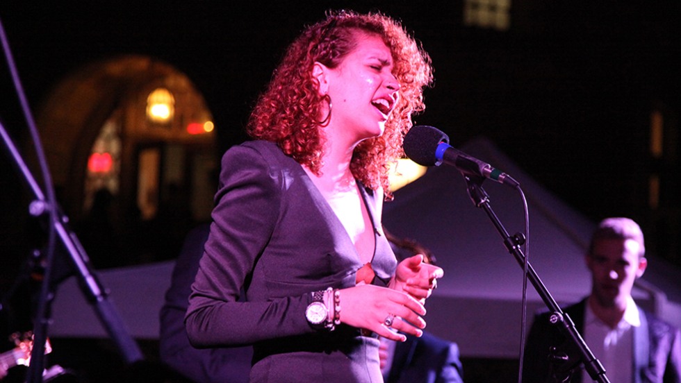 Campus Dance performer singing