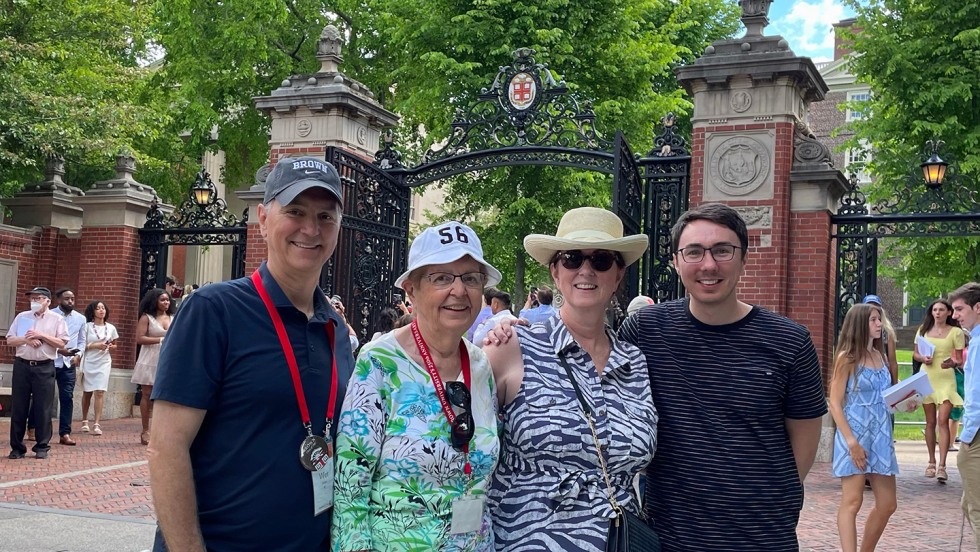 Four Brown alumni by the Van Wickle Gates 