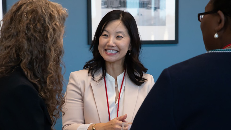 Susan Y. Chon '91 chatted with other alumni leaders at a cocktail reception