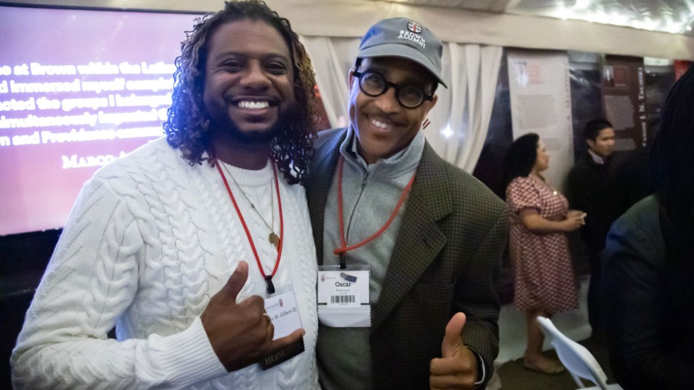 Eldridge H. Gilbert III ’05 and Oscar Groomes ’82, P’15 in the tent at WaterFire 