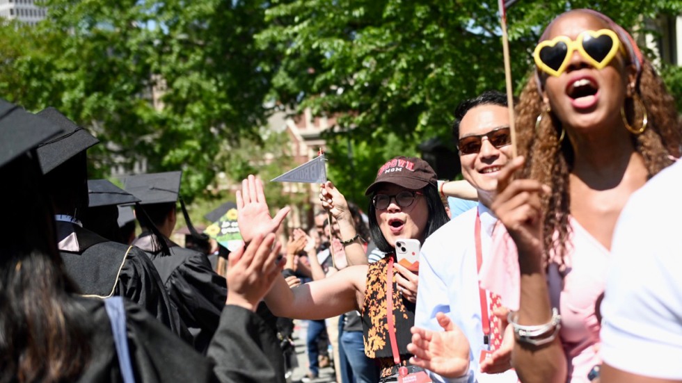 Cheering alumni line the streets for Procession