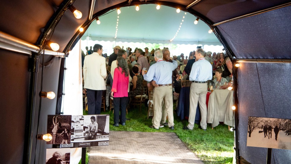 alums under the 50th reunion tent