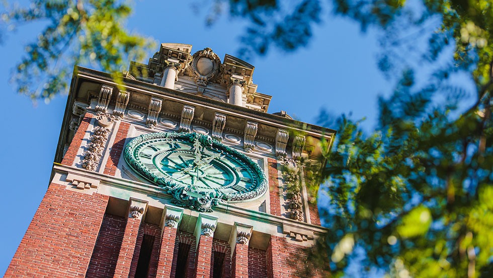 The Carrie Tower from below with tree branches on right