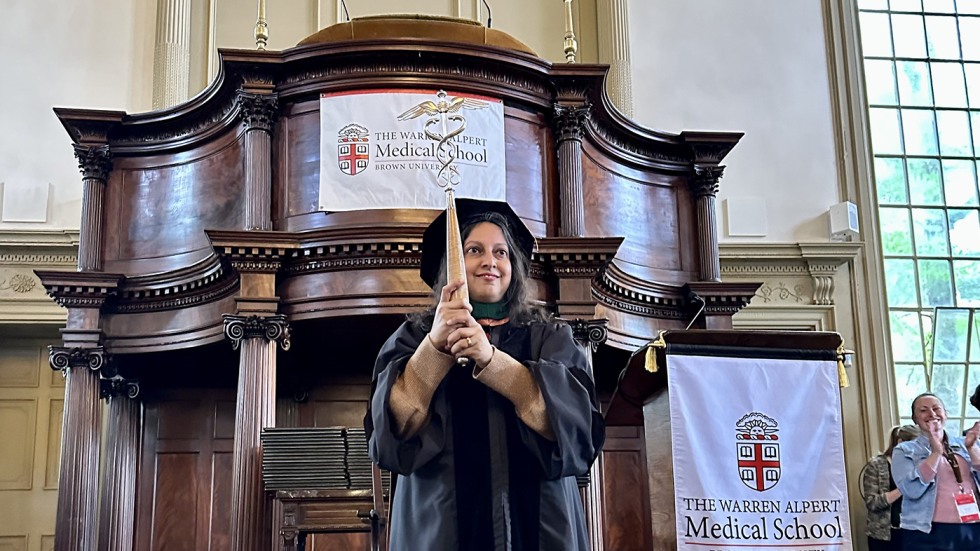 Kavita Ernst holding caduceus
