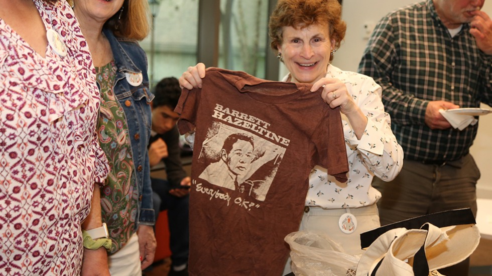 Someone holding up the t-shirt with Hazeltine's phrase