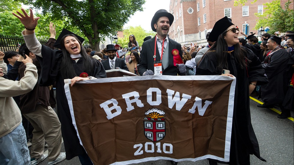 Members of the Class of 2010 holding up their class banner during Procession.