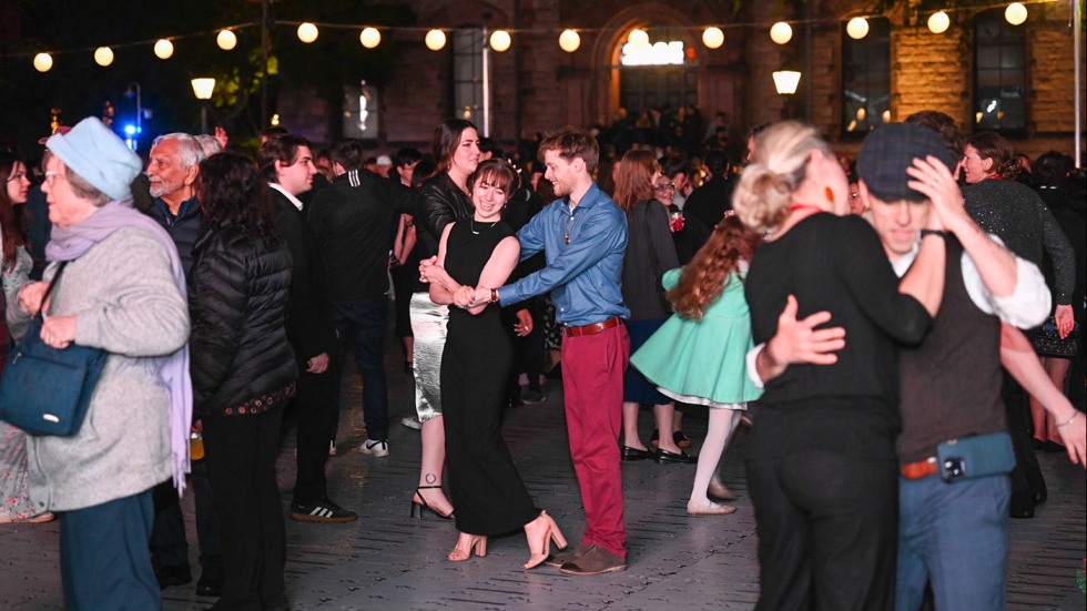 The dance floor at Campus Dance with a large group of attendees dancing.