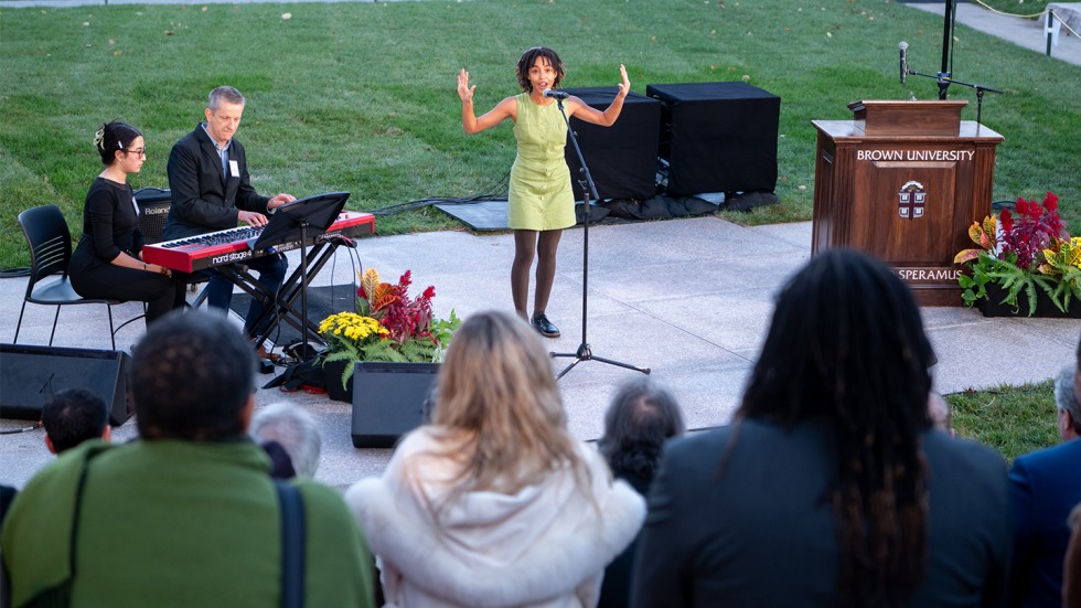Brown MFA student Erin Lockett performing at a ceremony celebrating the naming of the new Stephen Sondheim Amphitheater