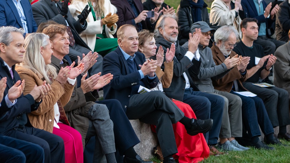 The audience applauding the performances at the dedication of the amphitheater