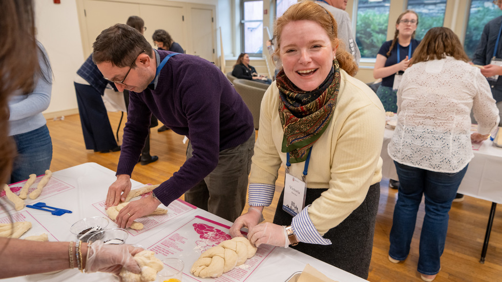 Alumni and students making challah at Brown RISD Hillel. 