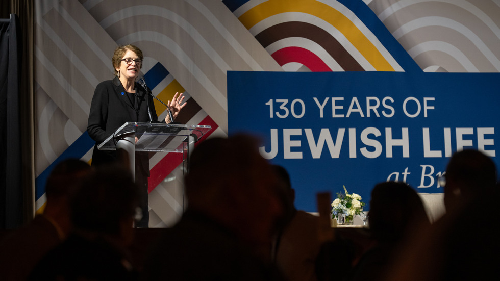 Brown President Christina H. Paxson speaking at the “Shabbat Under the Stars” dinner