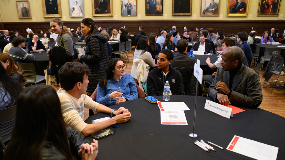Alumni and students connecting at the networking event