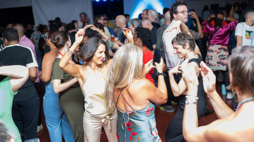 A lively group of people dancing energetically.