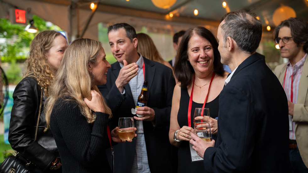 Members of the Class of 2001 mingling and talking.