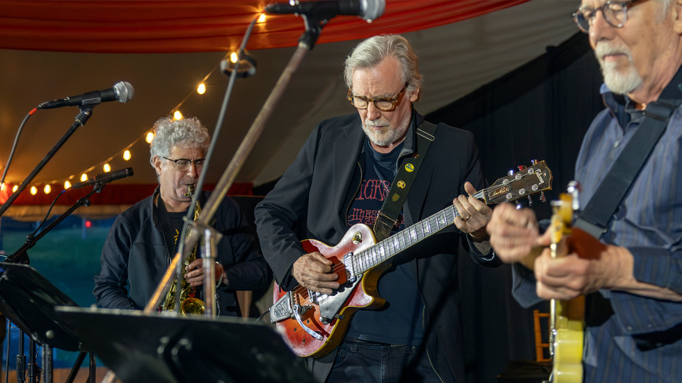 A band made up of members of the Class of '76 performing at their class event.
