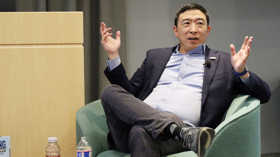 Andrew Yang speaking at the fireside chat on AI.