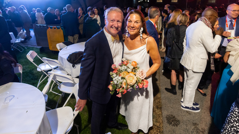 The bride and groom in their wedding attire at Campus Dance.