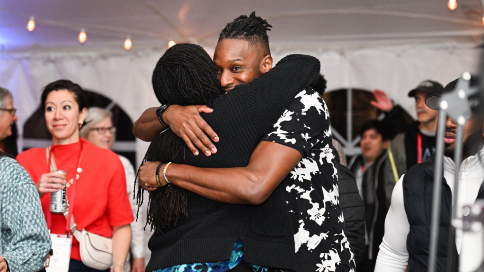 Two people hugging at Unity Funk Nite