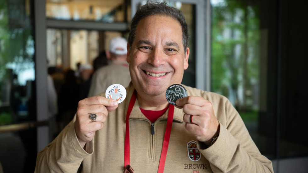 An alum holding up two Hazeltine pins.