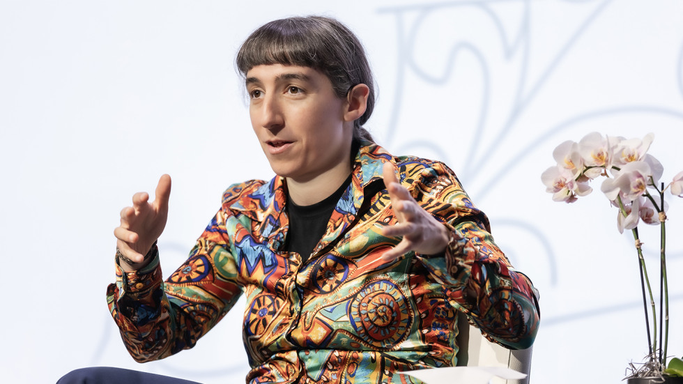 Brenda Rubenstein speaking, gesturing with her hands.