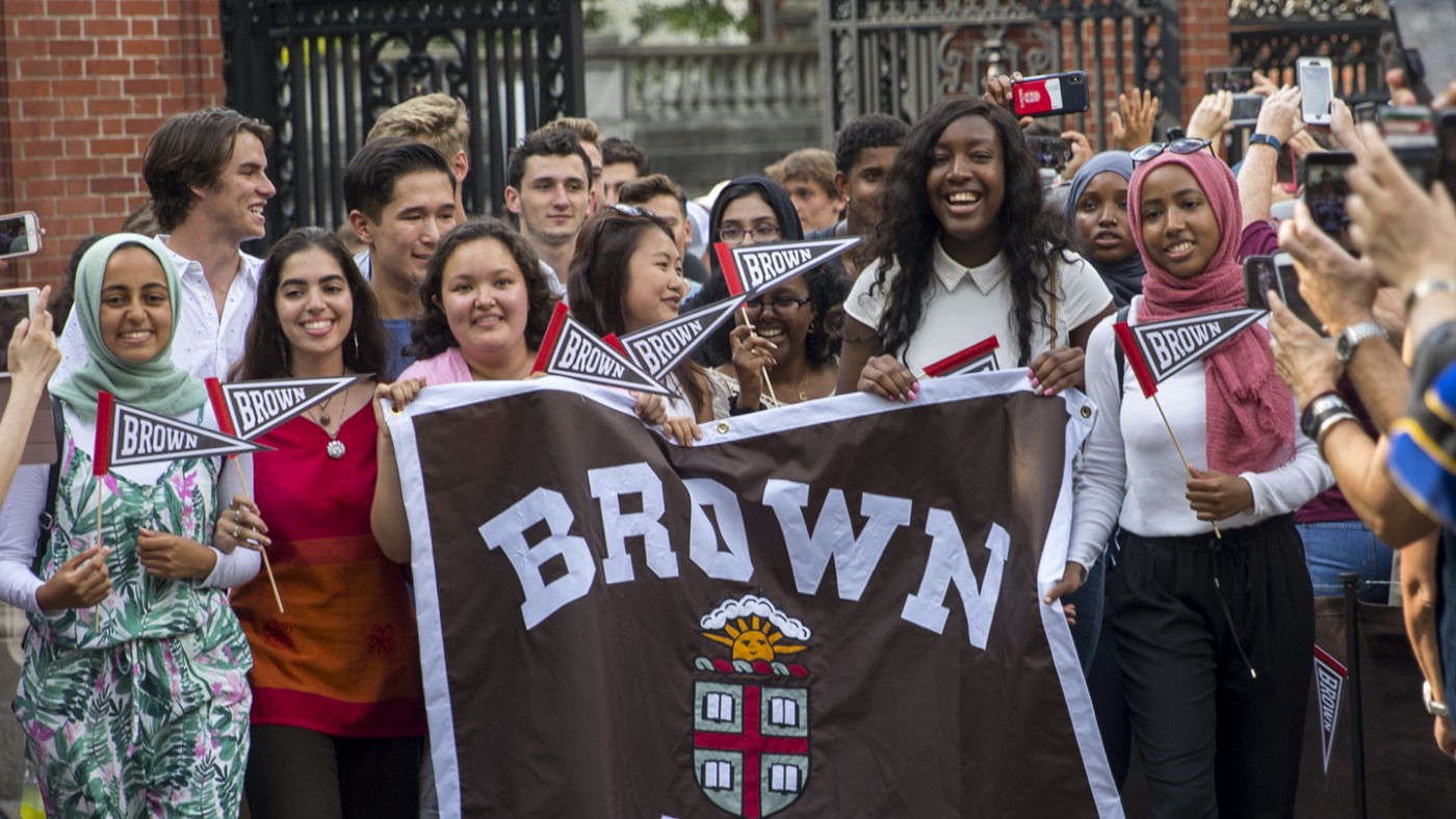 Students processing through the Van Wickle Gates during Brown Convocation