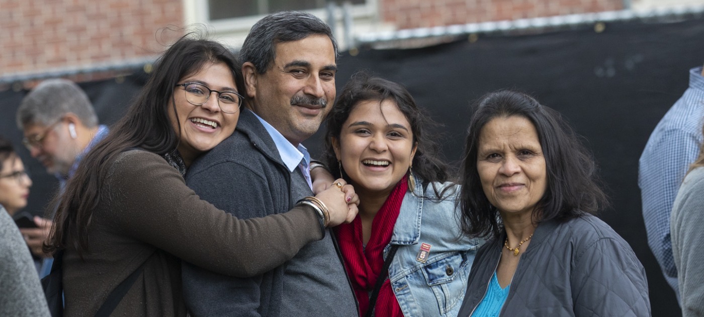 Student with her family during Brown Family Weekend