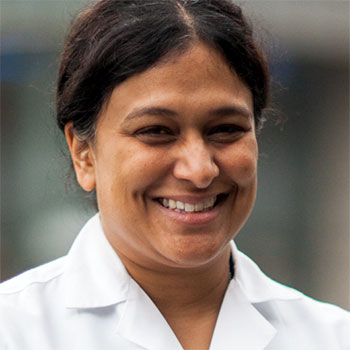 Smiling headshot of Kavita M. Babu